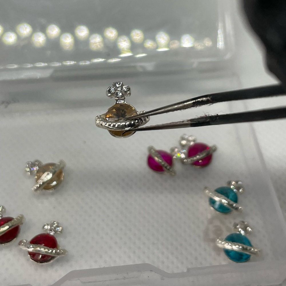 Vivian Westwood, nail decor. Great for y2k fashion and high fashion aesthetic.